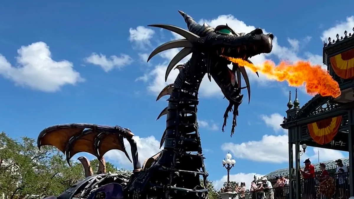 Magic Kingdom festival of fantasy parade maleficent fire dragon